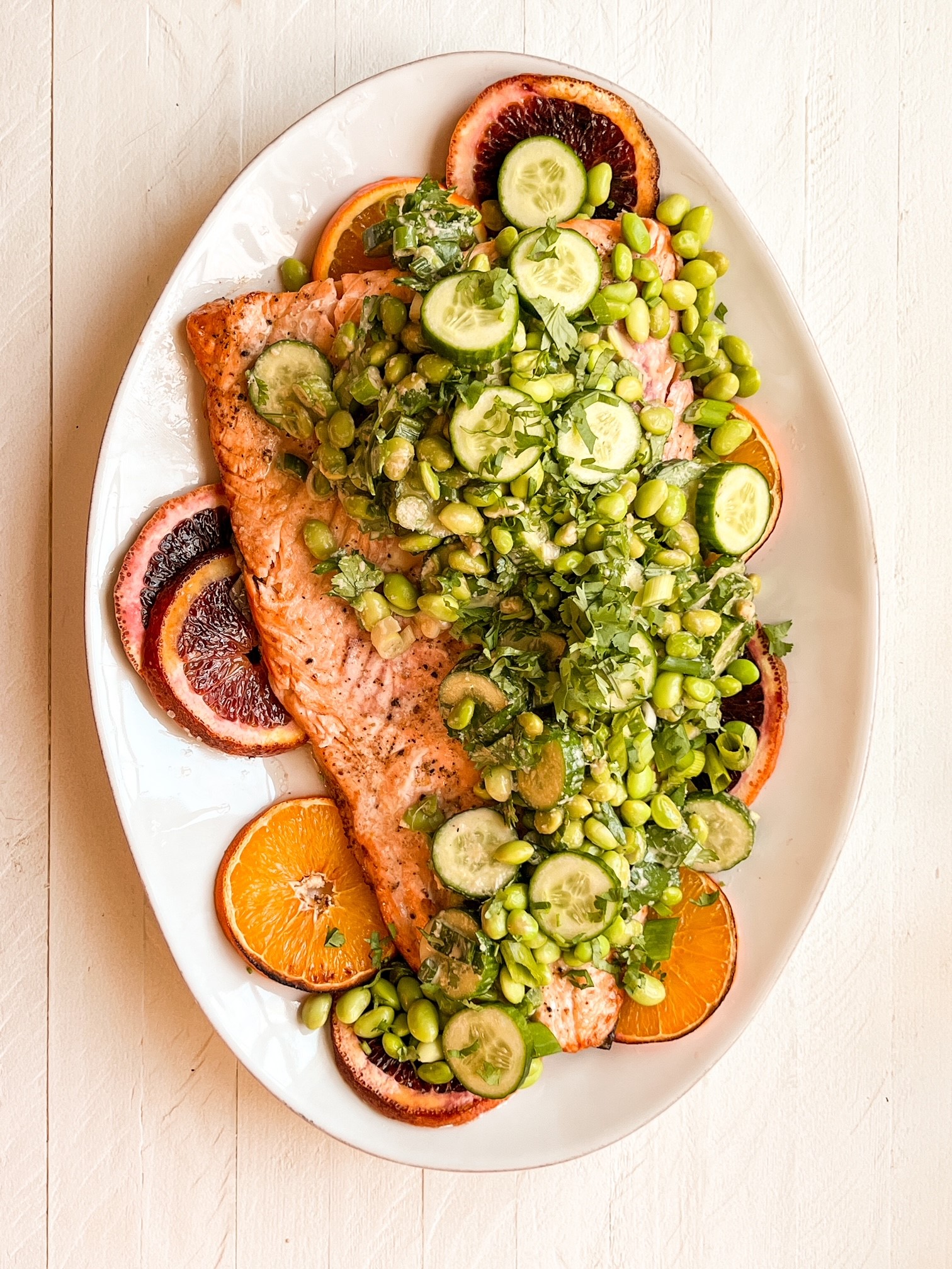 orange salmon with an asian edamame & cucumber salad